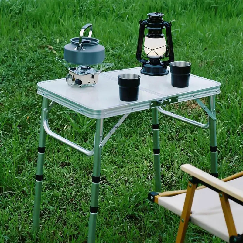 Foldable camping table with 3 heights