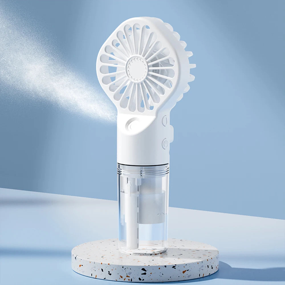 Mini hand fan with water tank