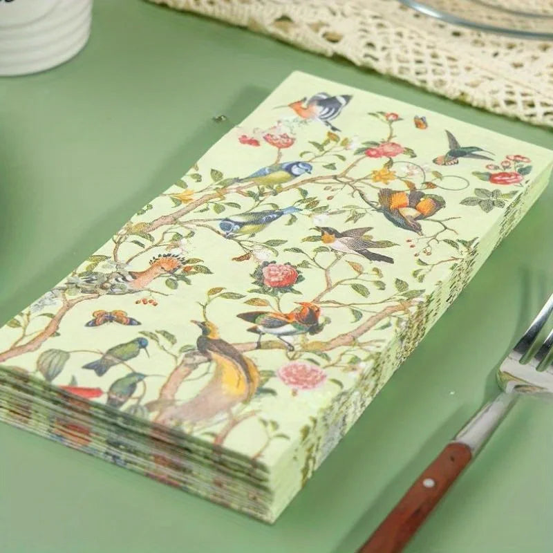 Vintage napkins with flower and bird motifs