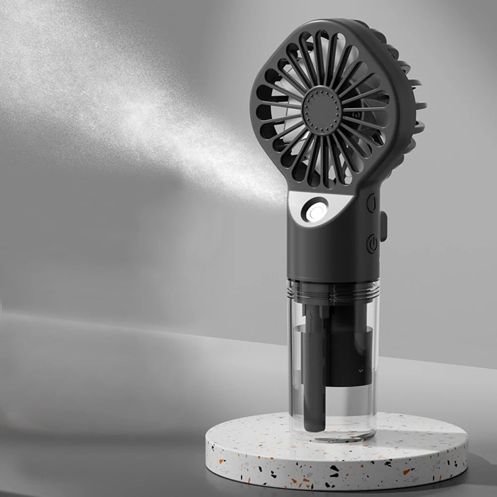Mini hand fan with water tank