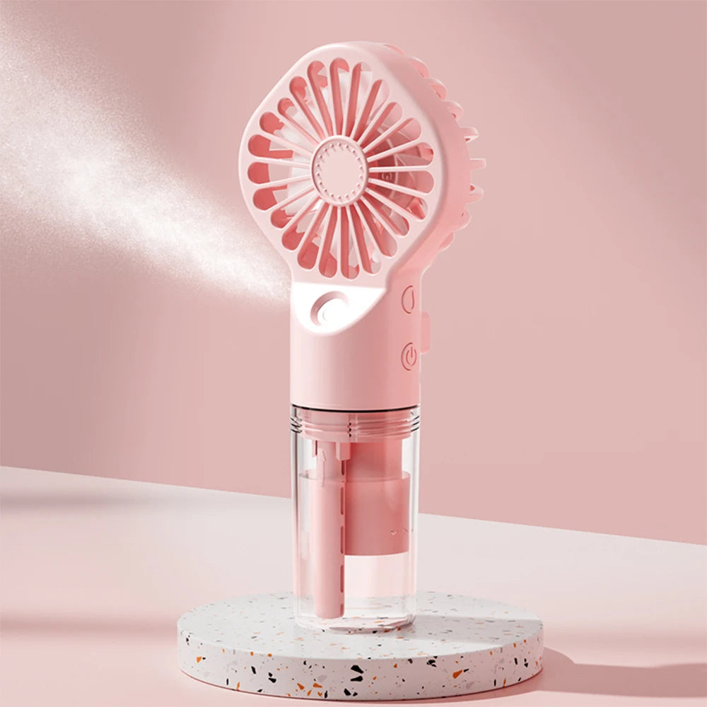 Mini hand fan with water tank
