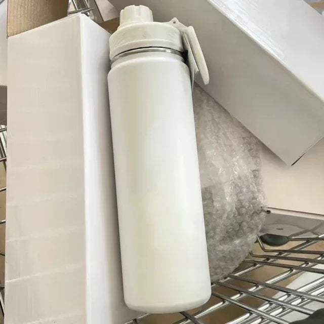 Stainless steel insulated drinking bottle 710 ml