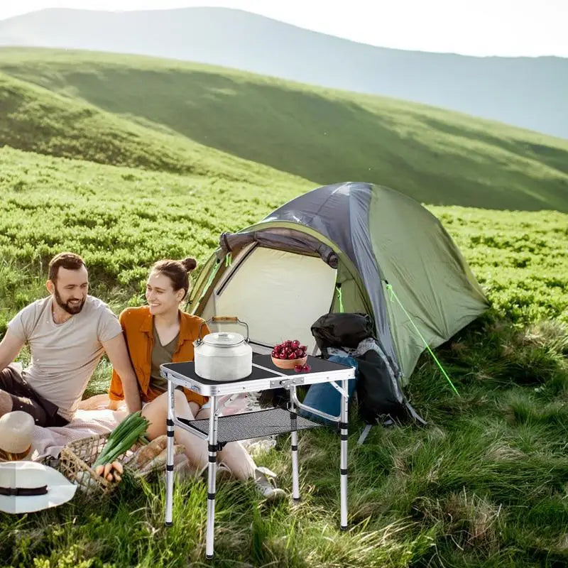 Foldable camping table with 3 heights